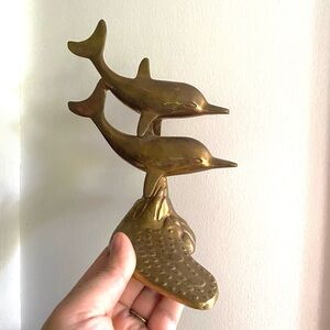 Brass dolphins